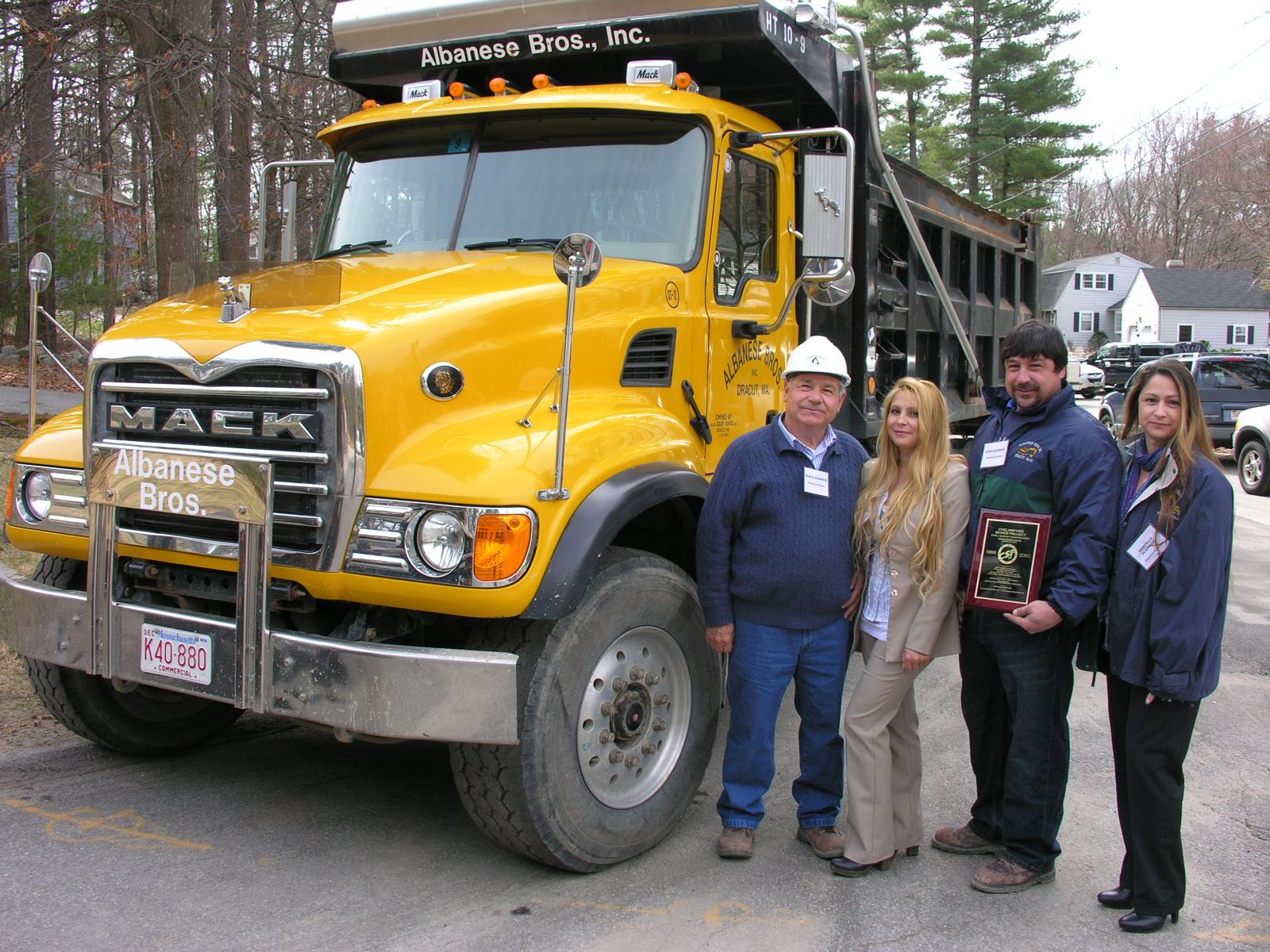 Albanese Brothers accept a plaque from the Town of Chelmsford. (ALBANESE BROTHERS PHOTO)