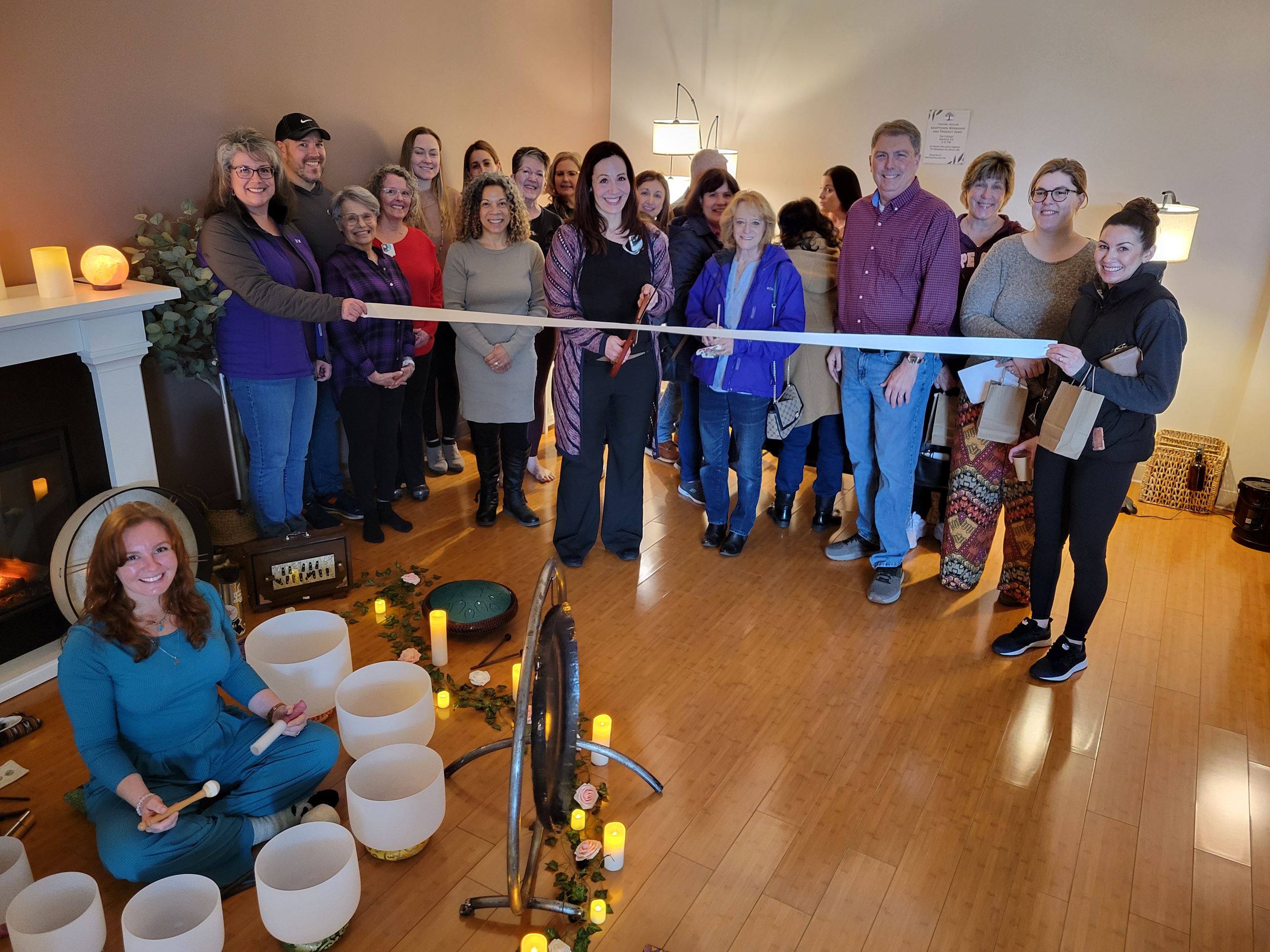 Kerri Foisy cuts the ribbon at Rooted Wellness Company, 155 Broadway Road, Dracut.